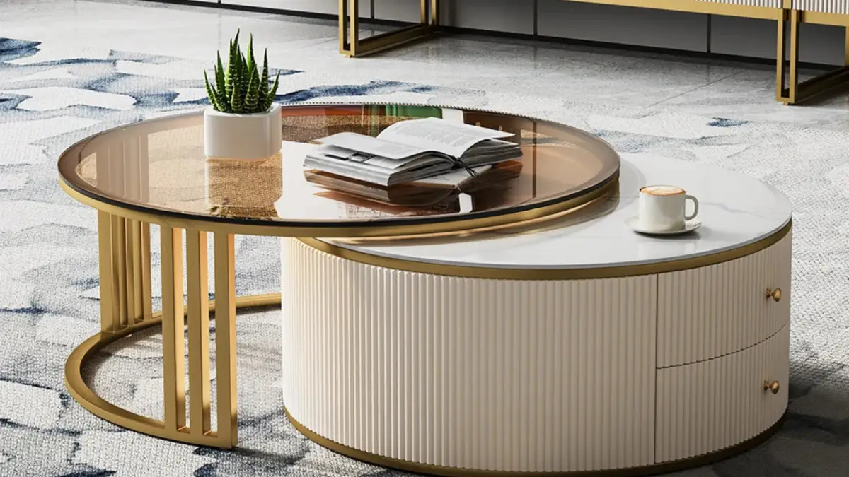 Grovyn 28"-32" round nesting coffee table set with sintered stone tops and gold accents, shown in a modern living room, featuring space-saving nesting design.